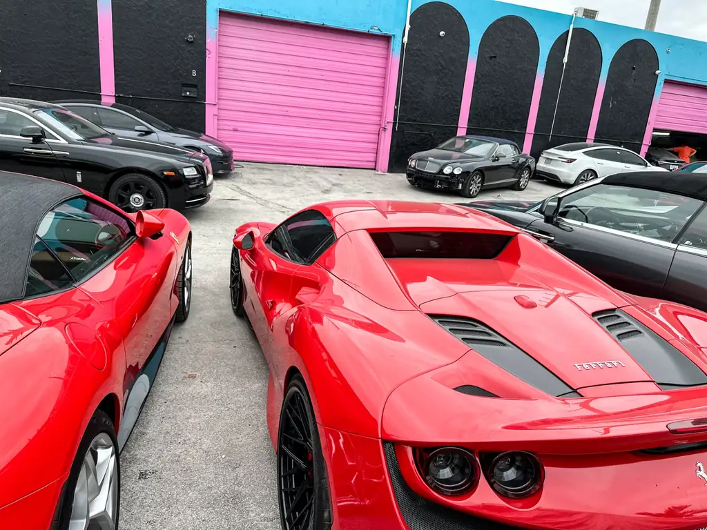 Ferrari and Rolls-Royce at Car Geeks Collision luxury bodyshop